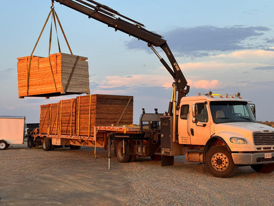 A BarrierDirect Truck loading up a fencing shipment for some eagerly awaiting customers.