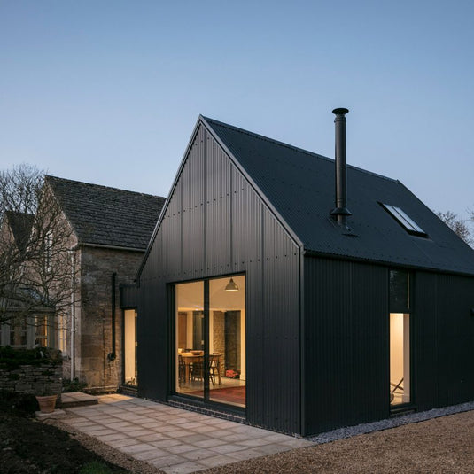 corrugated-metal-extension-eastabrook-architects-residential-house-england-uk
