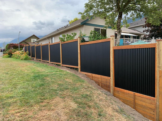 Corrugated metal fence with wood frame