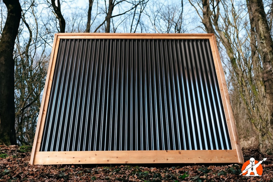 Black Corrugated Metal Fence Panel Framed in Premium Lumber by BarrierBoss USA.