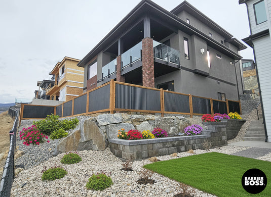 Black Metal Fencing on Landscaped Property
