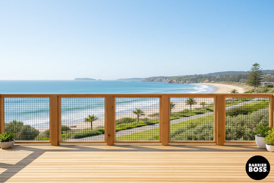 Brown hog fencing framed in premium wood used on coastal patio as deck railing.