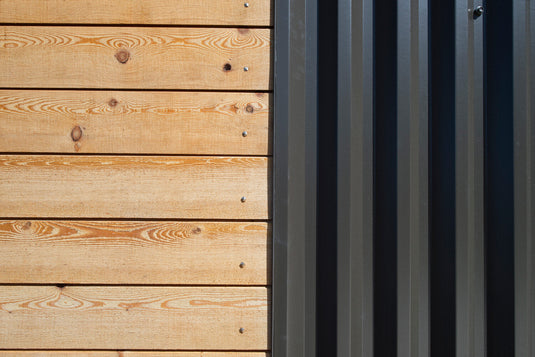 corrugated metal panels in black PVDF paint