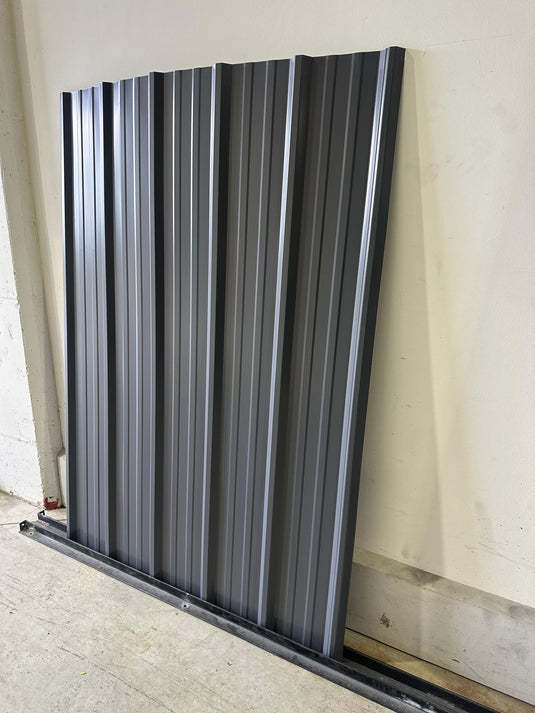 Corrugated metal siding in Charcoal Grey