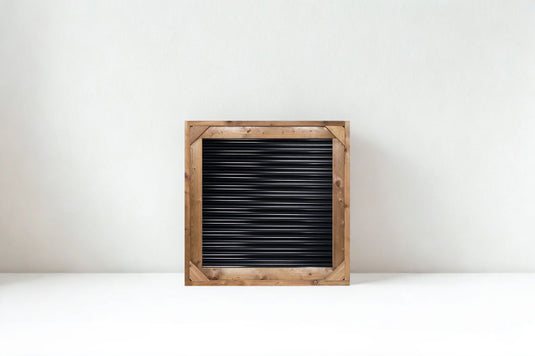 Framed corrugated metal fence panel.