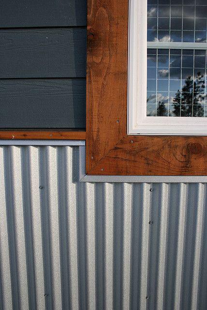 Close-up of salt-resistant metal panels on Oregon coast cottage