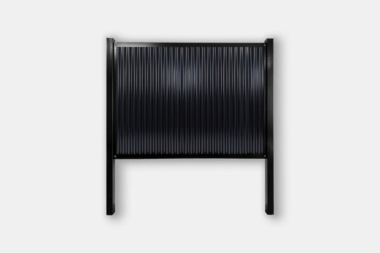 Zero-maintenance black metal privacy fence by BarrierBoss
