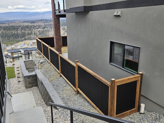 Paradise Found: Black Corrugated Metal Fence Panels for Privacy