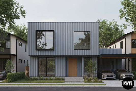 A Contemporary Home with BarrierBoss Deep Groove Metal Siding in Coastal Gray.