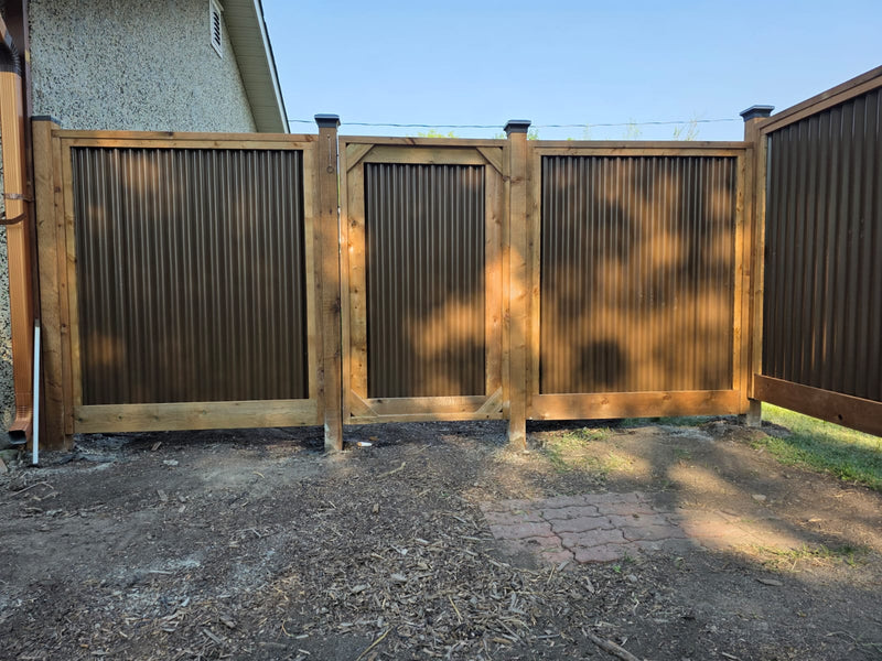 Load image into Gallery viewer, Corrugated Metal Fence Panel - Treated Frame Privacy Fence (Premade) - The Yellowstone
