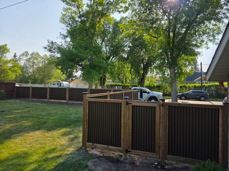 Load image into Gallery viewer, Corrugated Metal Fence Panel - Treated Frame Privacy Fence (Premade) - The Yellowstone
