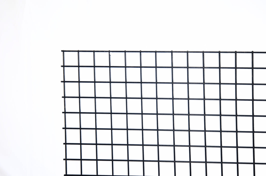 Black hog wire fence panel with pressure treated wood frame ready to install - BarrierBoss USA
