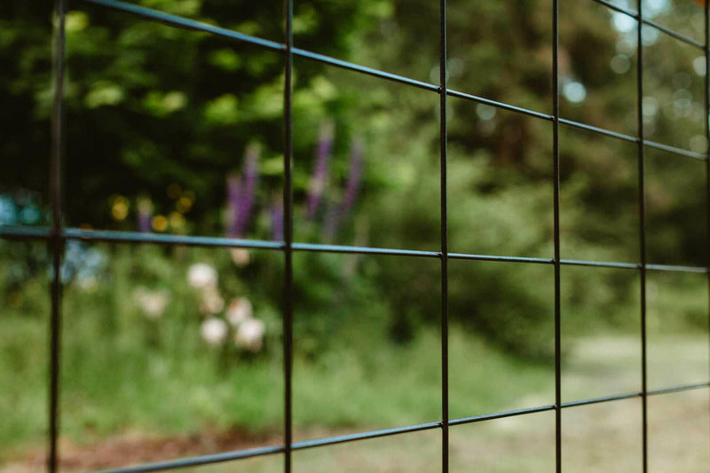 Load image into Gallery viewer, &quot;The Tough Panel&quot; Hog Wire Fence Panel - Gauge 6 Black Metal Hog Mesh 4&quot; x 4&quot; Openings (Framed or Unframed) - BarrierBoss™
