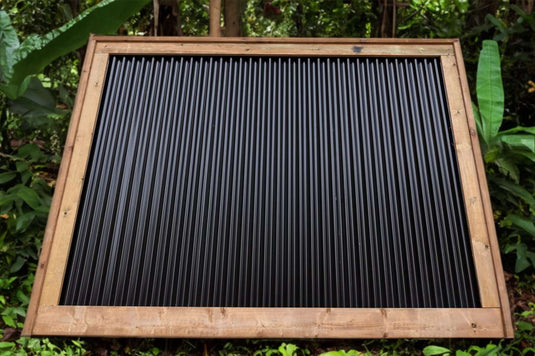 Corrugated Metal Fence Framed in Brown Pressure Treated Lumber - BarrierBoss™
